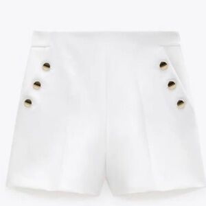 Shorts with buttons on each side